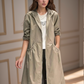 Manteau de pluie long avec capuche ajustable, vue de face