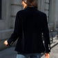 Veste en velours avec boutons dorés et revers élégants