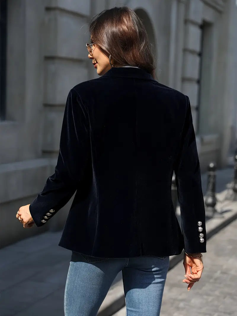 Veste en velours avec boutons dorés et revers élégants