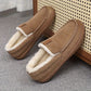 Chaussons montrés de profil avec semelle visible