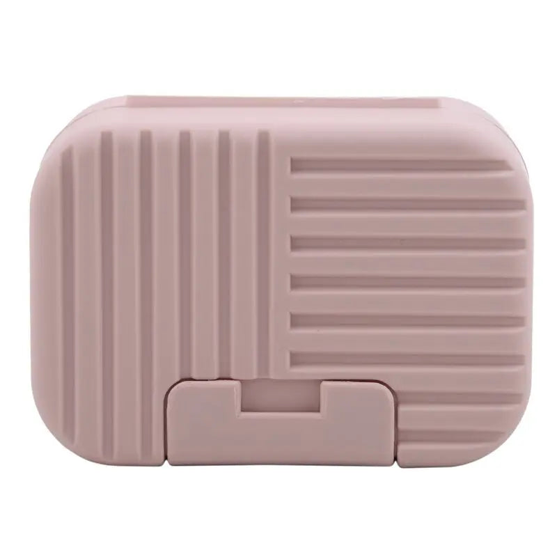Boîte à savon rose avec rayures, design compact