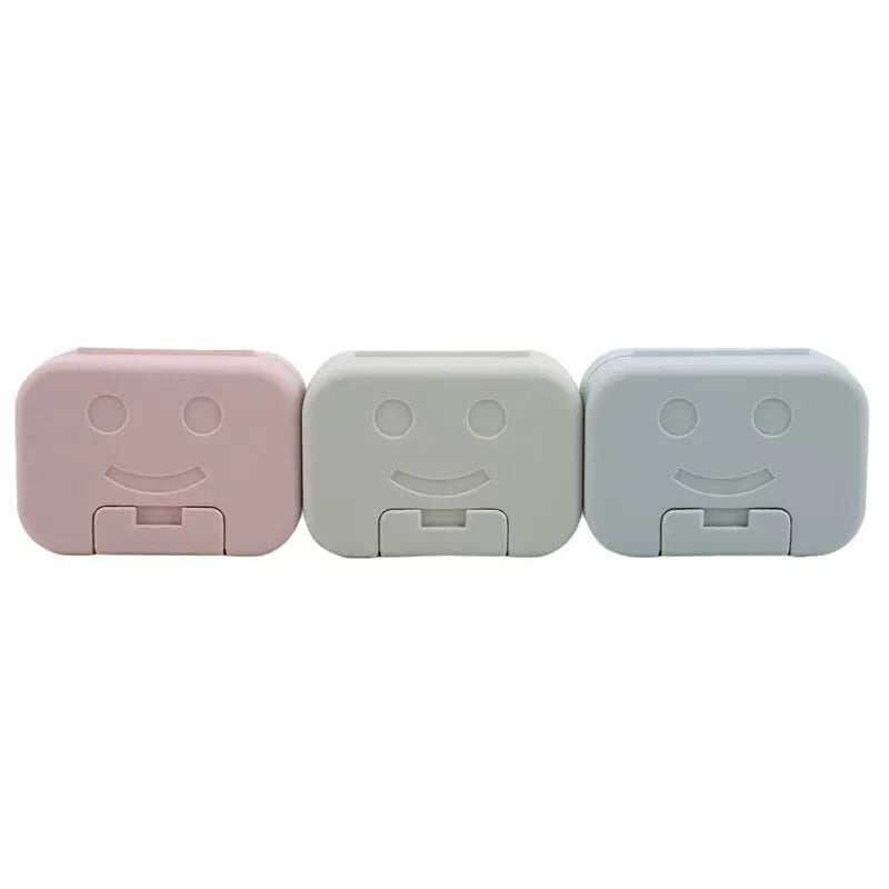 Détail du motif smiley sur la boîte à savon