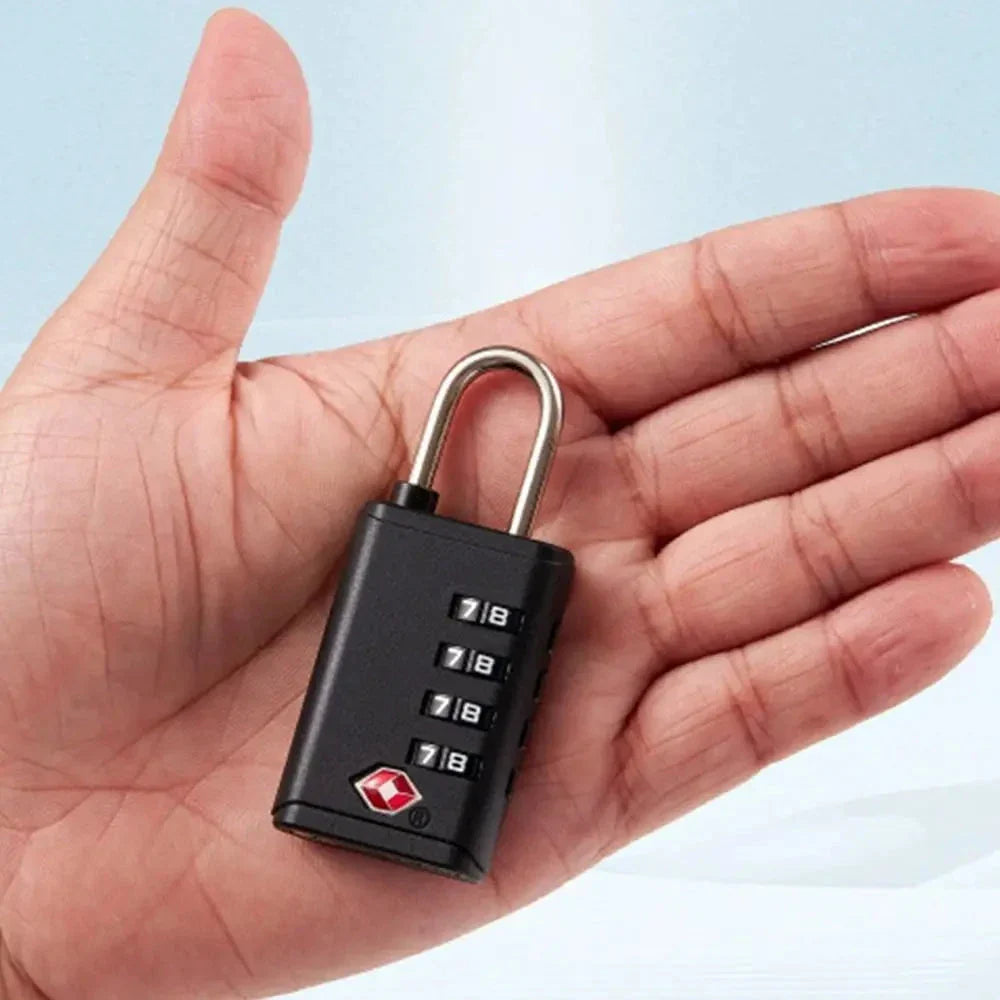Gros plan sur les molettes du cadenas TSA