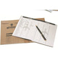 Carnet de voyage avec cartes à gratter sur fond blanc