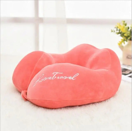Coussin de voyage rose en tissu moelleux pour la tête
