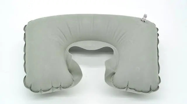Coussin gonflable gris en forme de U, texture douce
