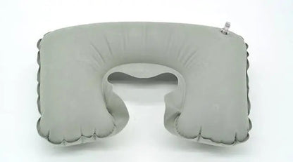 Coussin gonflable gris en forme de U, texture douce