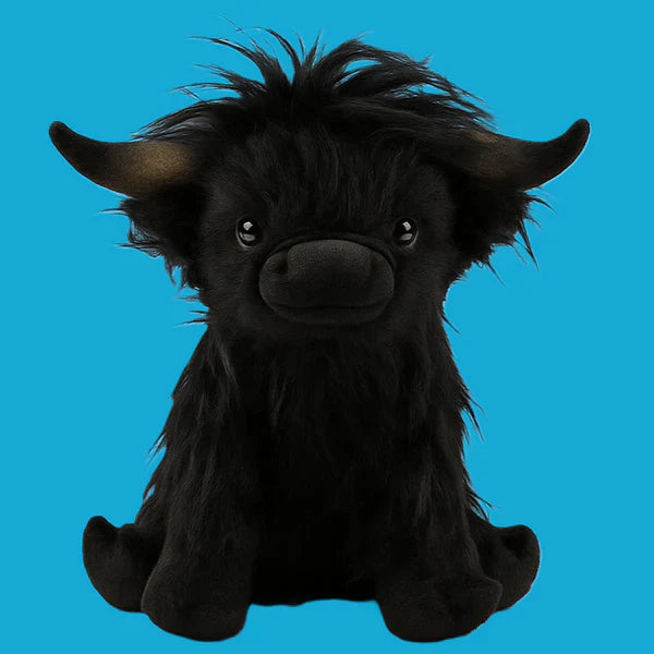 Gros plan sur la tête de la peluche vache Highlands
