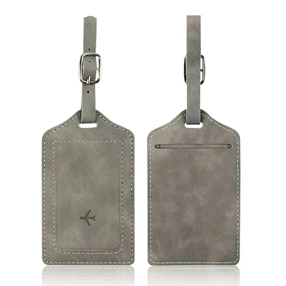 Étiquette grise avec motif avion pour valise