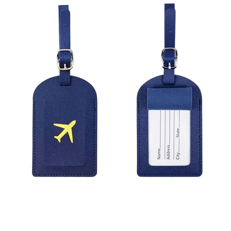 Étiquette bleu foncé avec avion doré, design raffiné