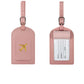 Étiquette rose avec avion doré, design chic