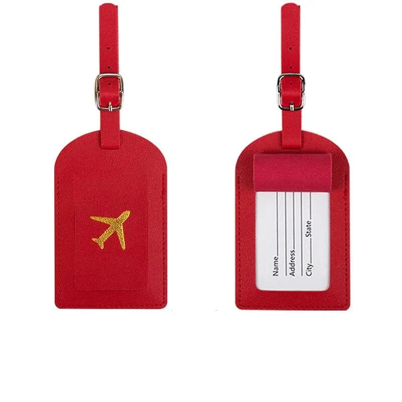 Étiquette rouge avec avion doré pour valise