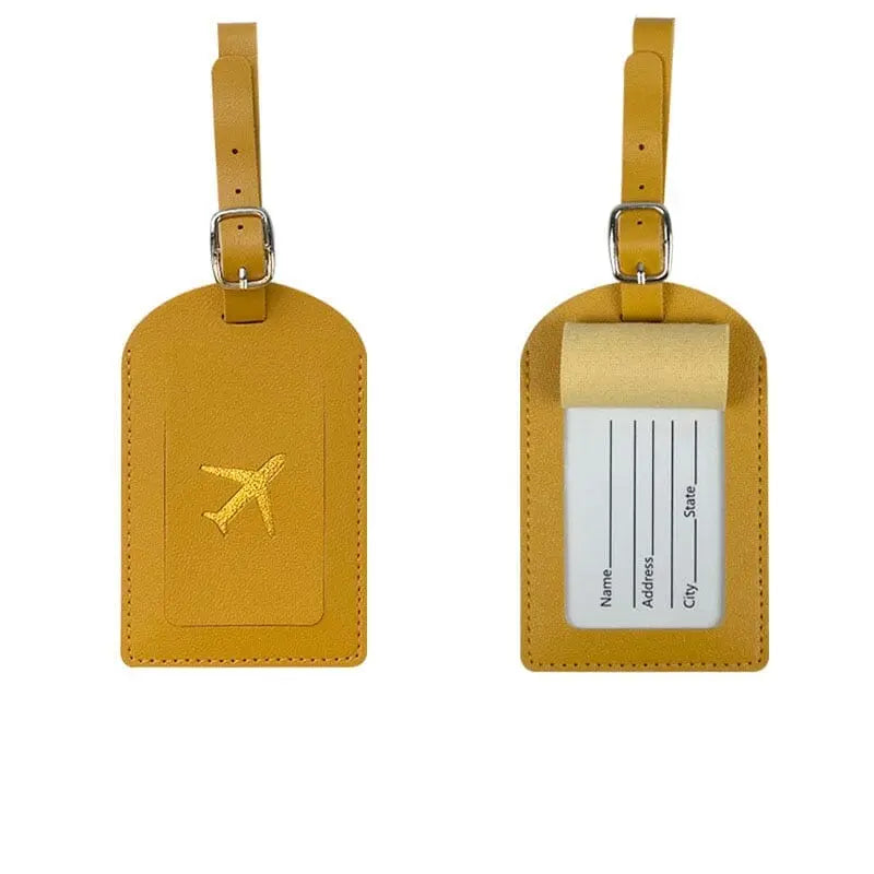 Étiquette jaune avec avion doré, touche vive