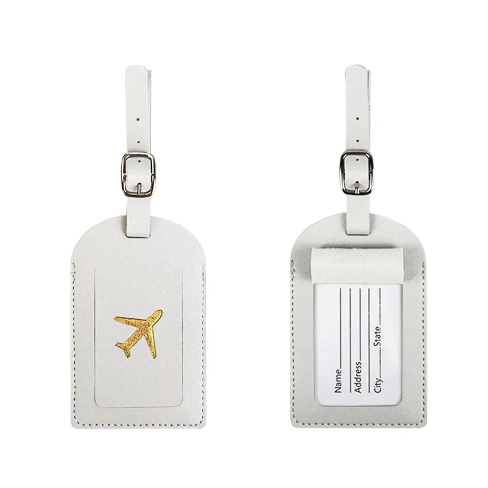 Étiquette blanche avec motif avion doré