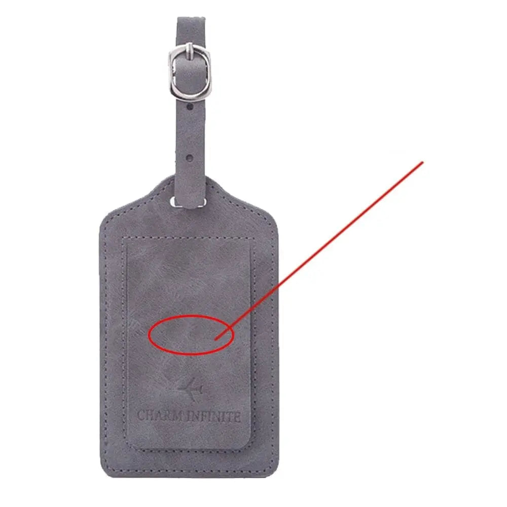 Étiquette grise avec motif avion, idéale pour valises