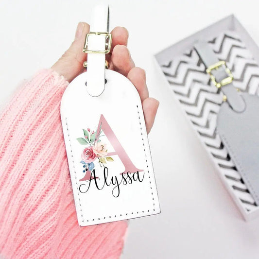 Étiquette de bagage pour femme avec initiale en relief