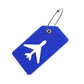 Étiquette de bagage verte avec porte-nom visible