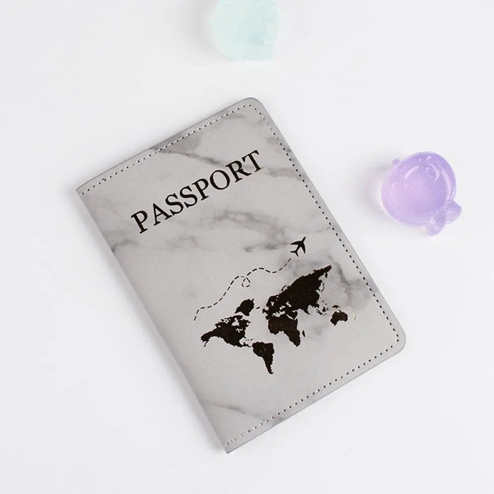 Étui gris avec design carte du monde marbré