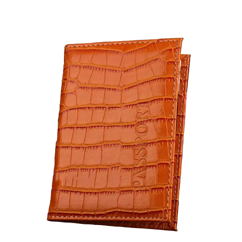 Étui passeport orange en cuir croco, vue de face
