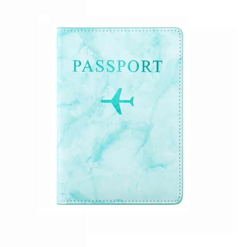 Étui passeport marbre turquoise avec avion doré