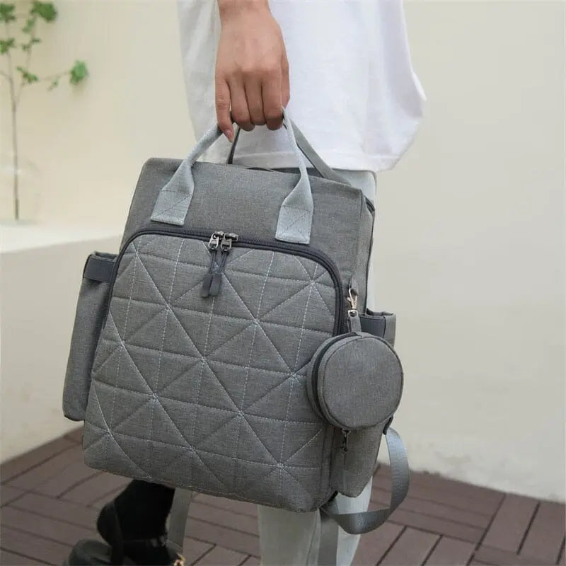 Détail des sangles pour attacher le sac à une poussette