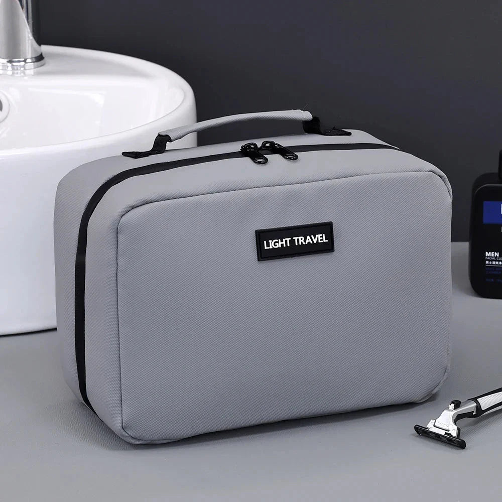 Vue de dessus de la trousse de toilette en tissu Oxford