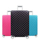Housse de valise motif diamants sur fond blanc