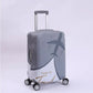Housse de valise grise avec avion et texte inspirant