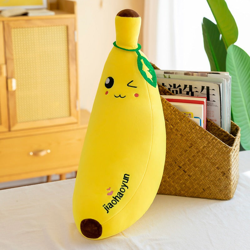 Peluche banane géante avec texture moelleuse et visage heureux