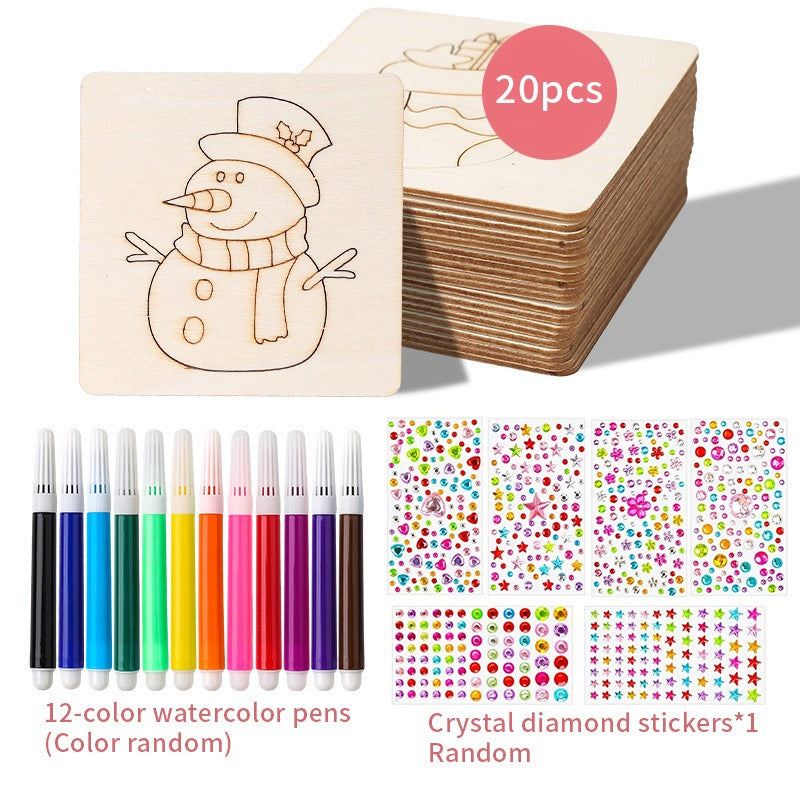 Vue de dessus d'un enfant créant une image avec des pochoirs