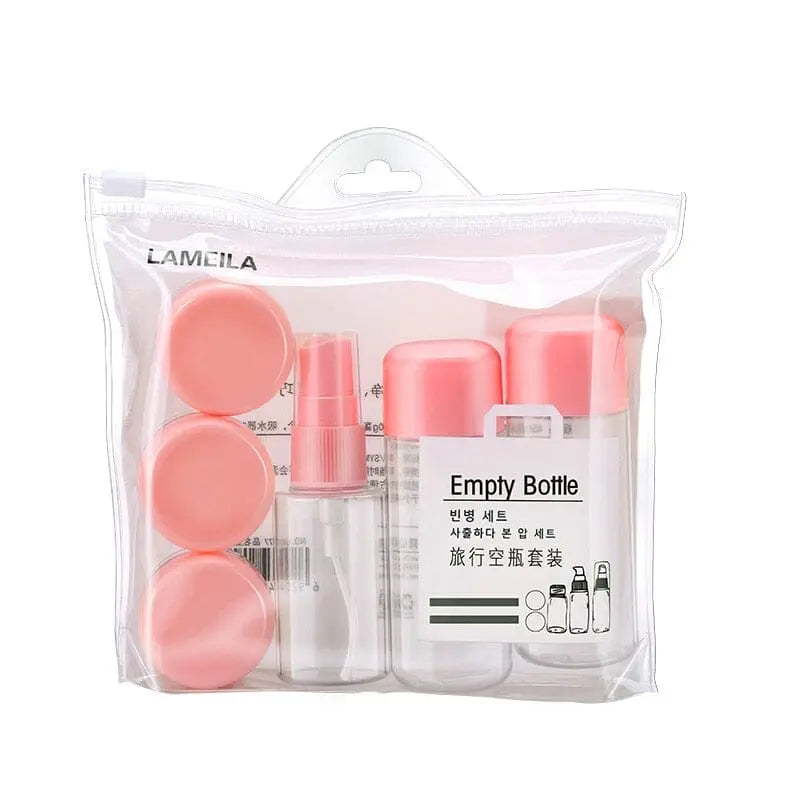 Trousse de voyage avec flacons et pots roses en plastique