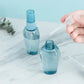 Trousse de voyage transparente avec flacons et accessoires