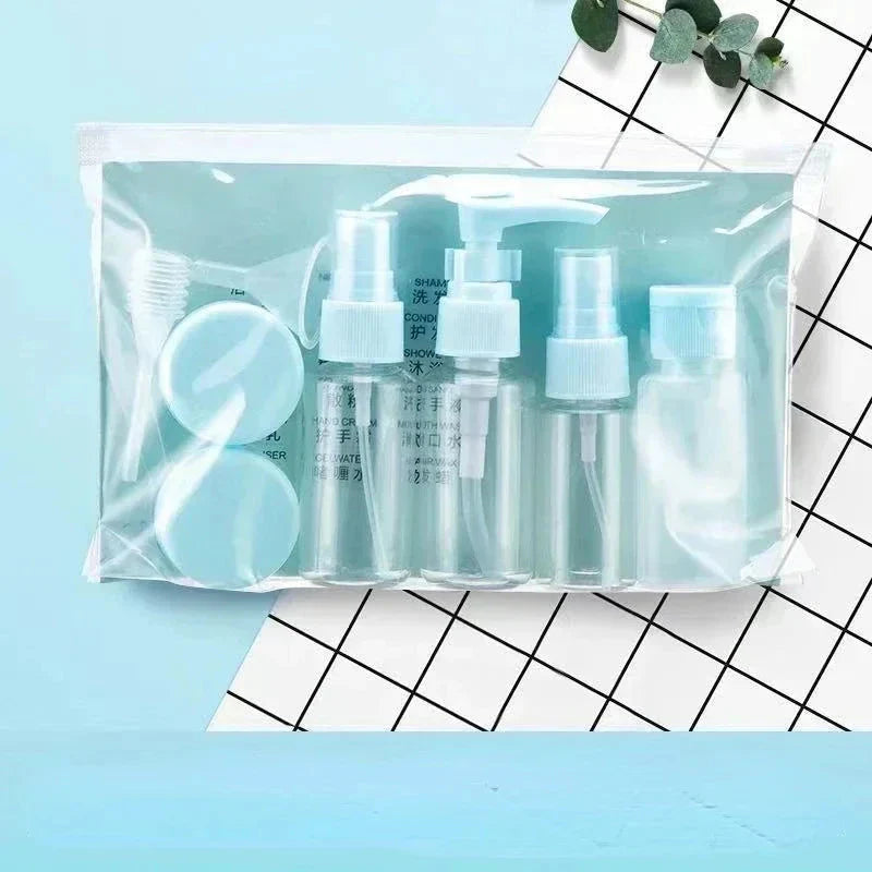 Kit de voyage avec flacons bleus et accessoires