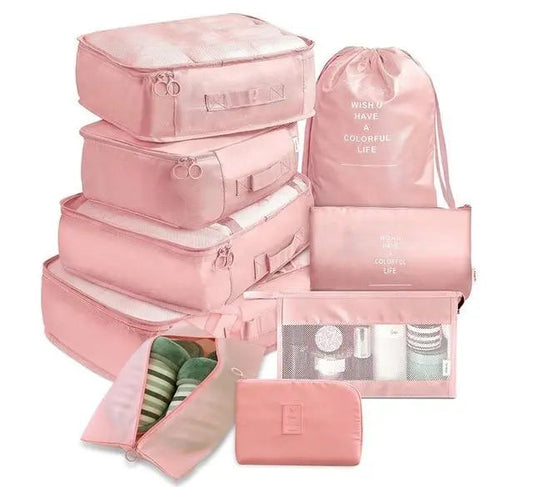 Ensemble de pochettes roses pour organiser une valise
