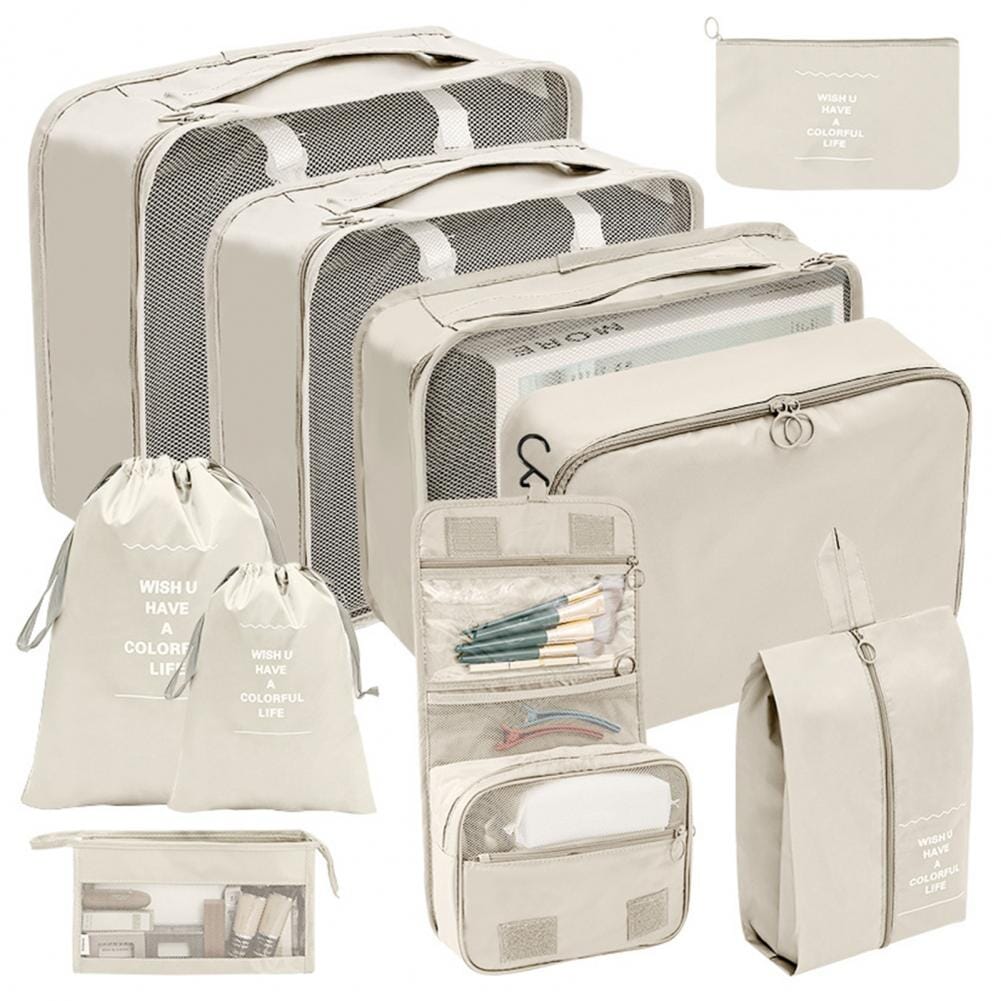 Set de 10 organisateurs de valise beige sur fond blanc