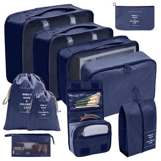 Ensemble de 10 organiseurs de valise bleu marine sur fond blanc