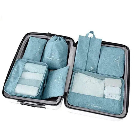 Ensemble de sept organisateurs de valise turquoise en nylon imperméable