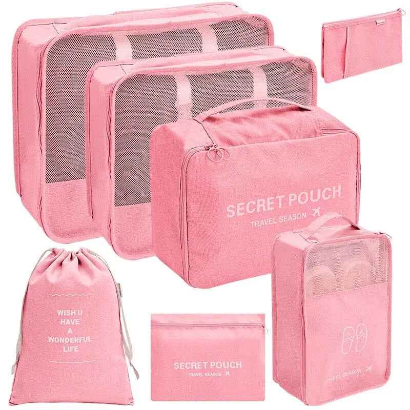 Pochettes de rangement rose pour bagages bien ordonnés