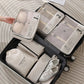 Cubes de voyage beige, parfaits pour une organisation élégante