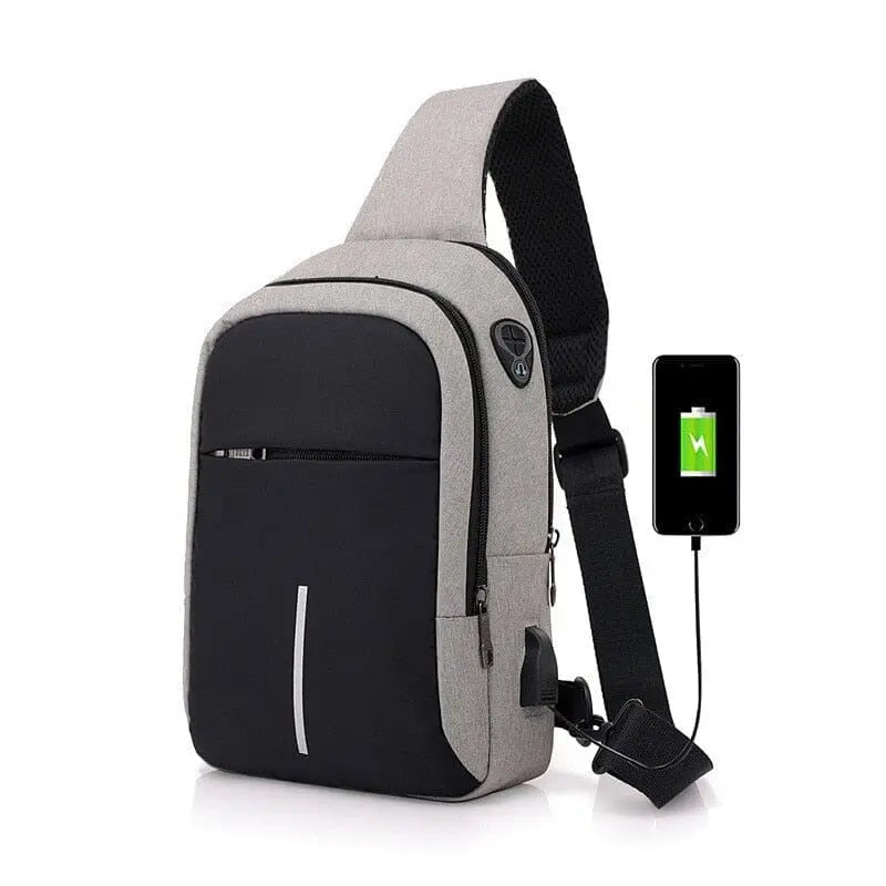 Détail du passage pour écouteurs sur le sac de voyage