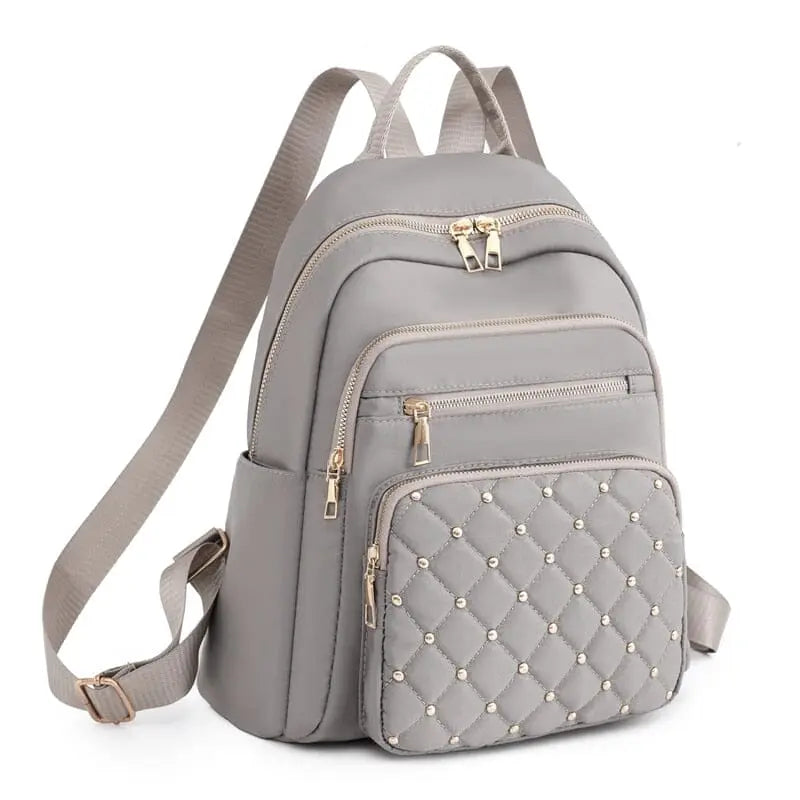 Vue de côté du sac à dos léger pour femme