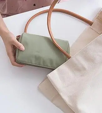 Trousse de maquillage avec poignée pour transport facile