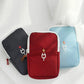 Pochette compacte dans un sac de voyage
