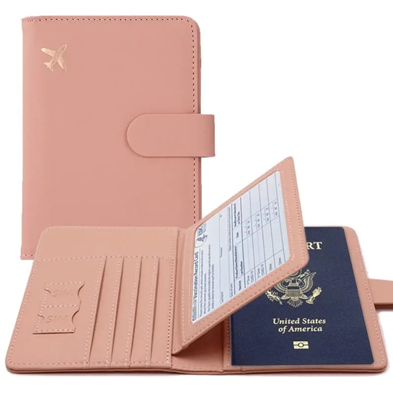 Portefeuille rose avec avion, ouvert pour montrer les emplacements