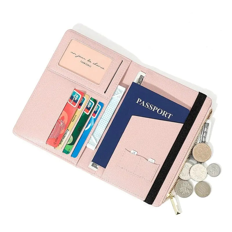 Portefeuille de voyage ouvert montrant compartiments pour cartes et passeport