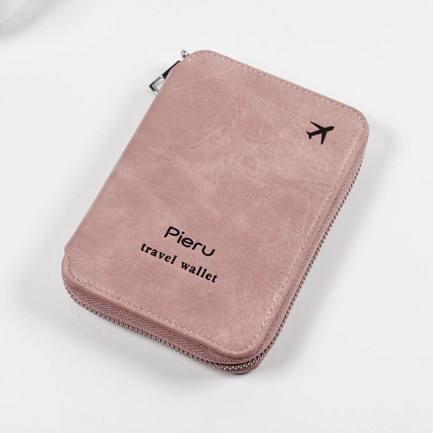 Portefeuille de voyage rose avec compartiments visibles