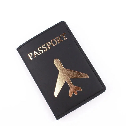Étui noir pour passeport, avion doré sur la couverture