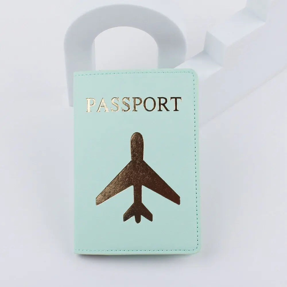 Étui vert pour passeport, avion doré en relief