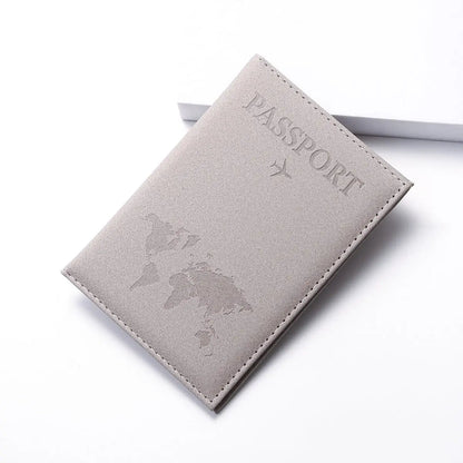 Protège-passeport gris avec design de carte du monde