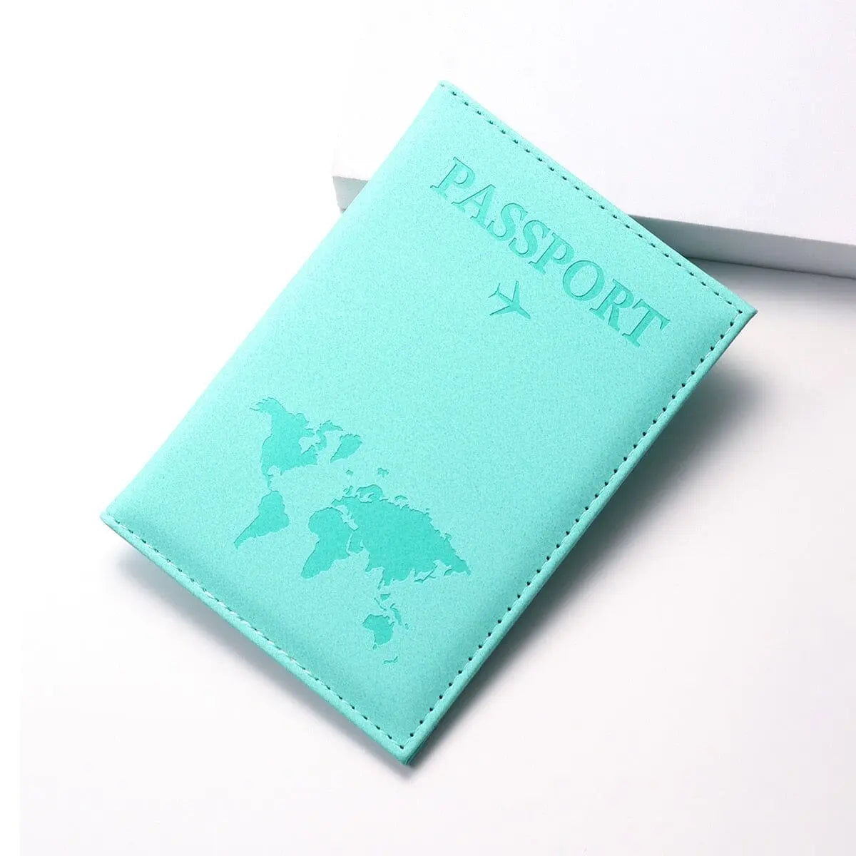 Étui turquoise avec motif mappemonde et texture lisse